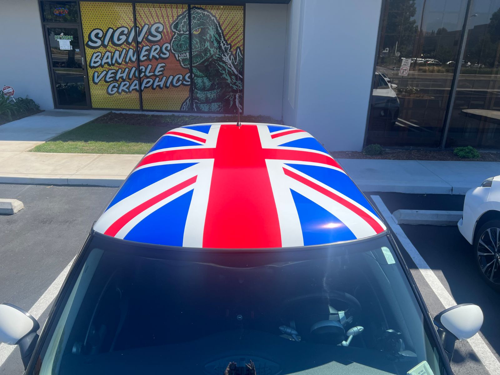 MINI Cooper roof wrapped in a printed Union Jack flag graphic